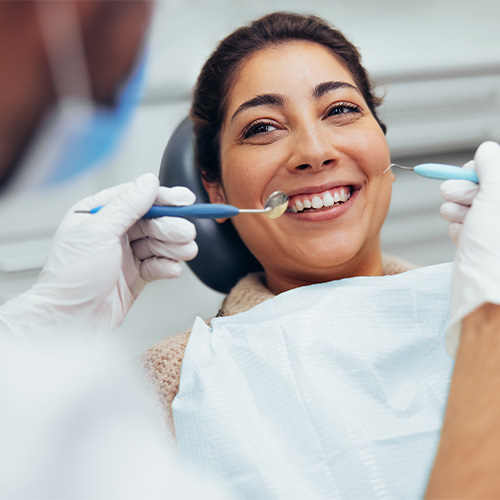 Woman Getting a Teeth Cleaning